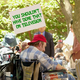 A Green Slime Syndrome sufferer protests outside of Nickelodeon's New York headquarters.